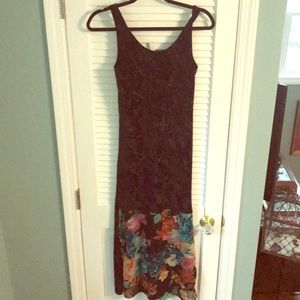 Long black fitted dress with floral panel